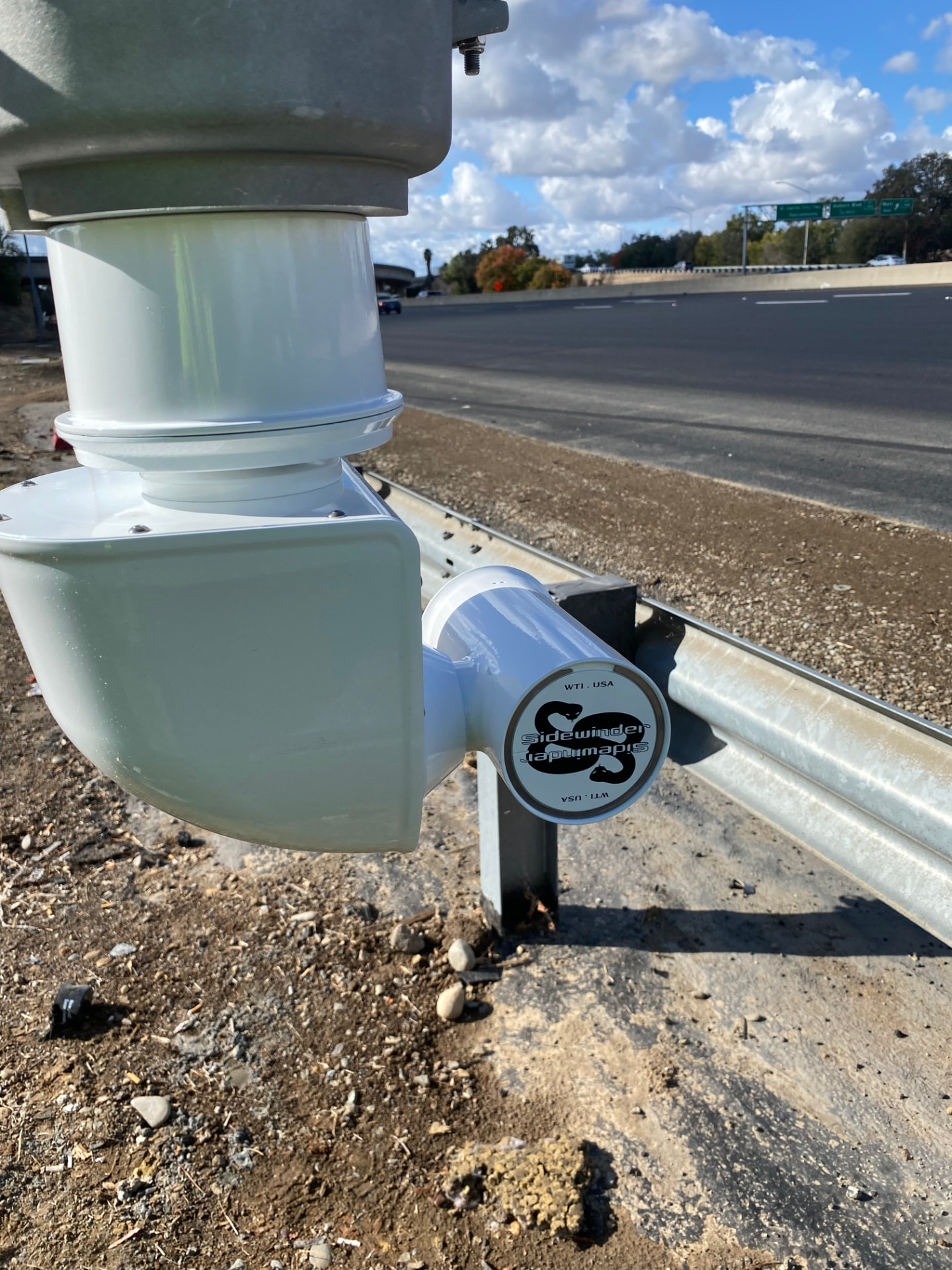 Sidewinder traffic camera mounted upside down beside a highway