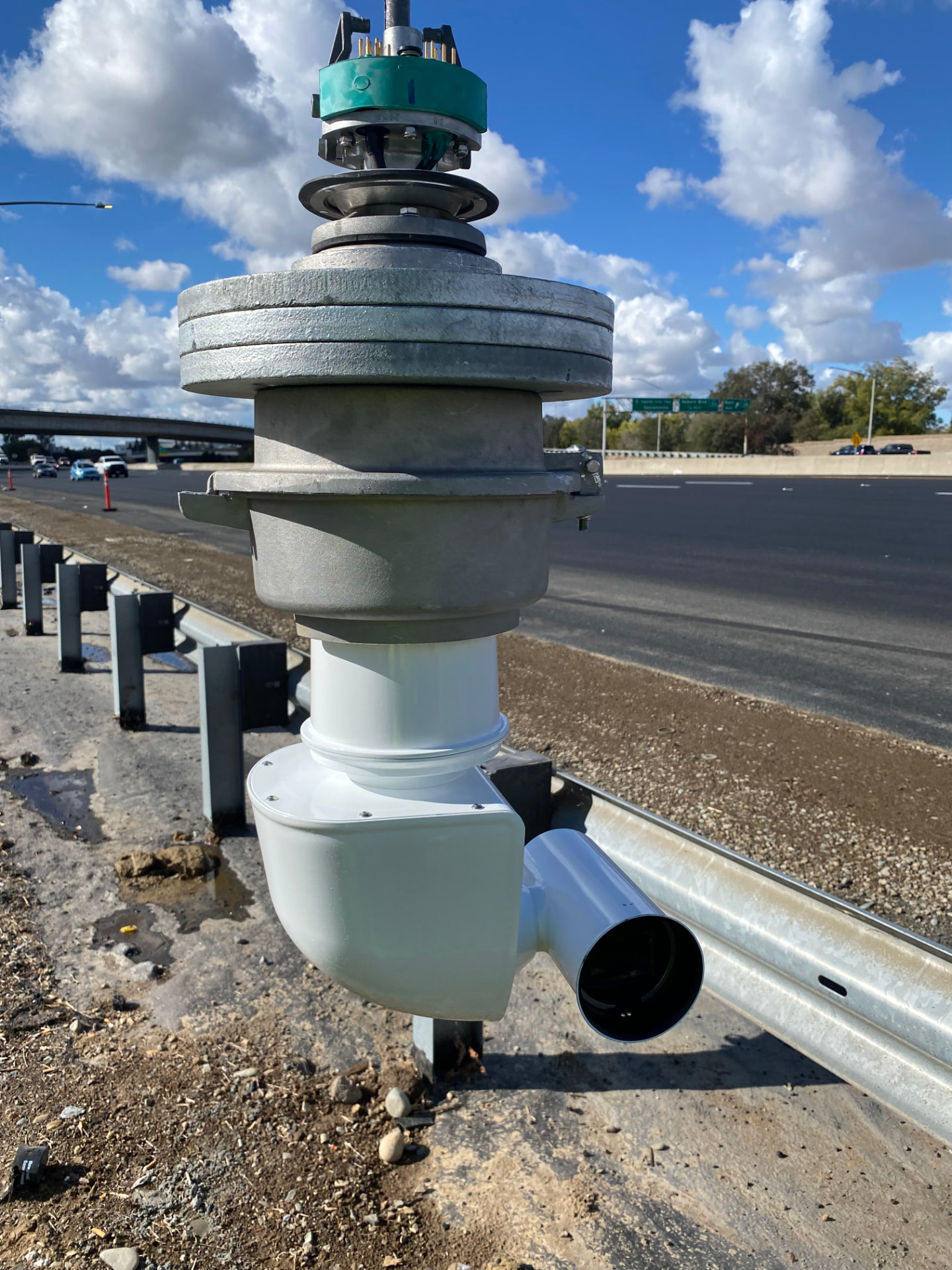Close view of an inverted Sidewinder roadside camera installation
