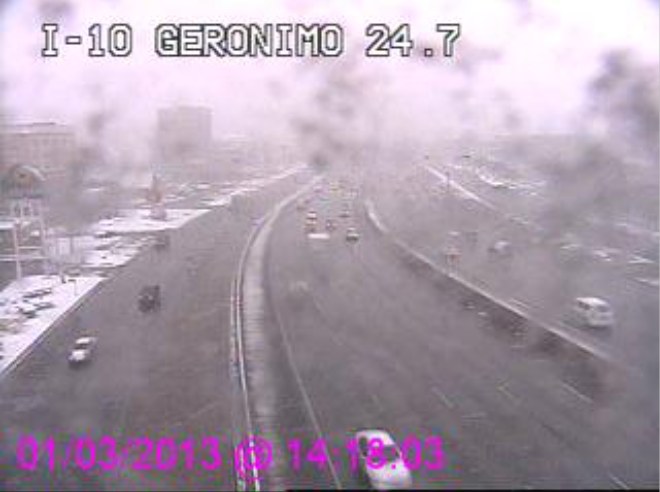 Competitor traffic camera view of I-10 at Geronimo with snow accumulating on the lens