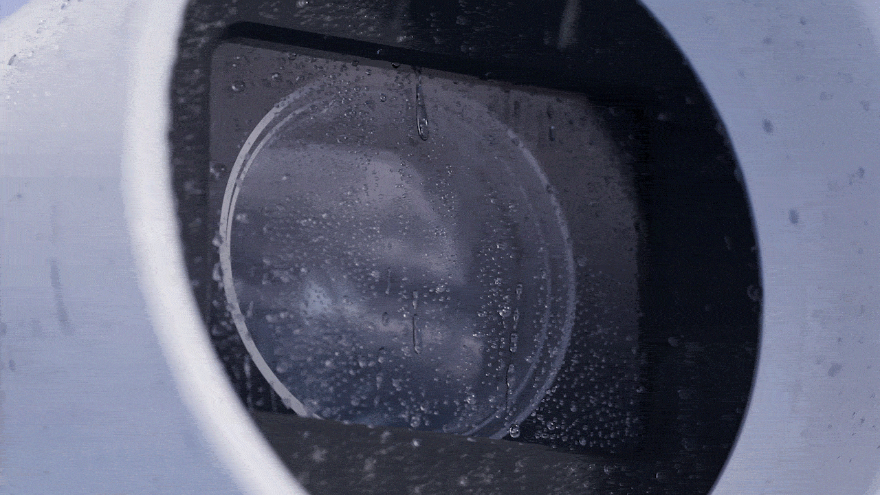 Rain sheeting off the Sidewinder hydrophilic window